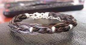 Load image into Gallery viewer, Living Horse Tails Celtic Braid Horse Hair Bracelet with Sterling Silver Beads. Custom jewellery Monika Australia horsehair keepsake
